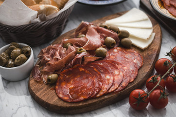 Spanish ham and cheese tapas on board