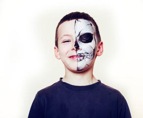 little cute boy with facepaint like skeleton to celebrate halloween, lifestyle people concept, children on holiday