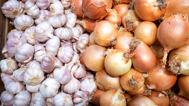 lots of fresh garlic and onion on the market