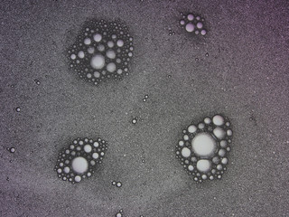 Abstract, decorative background, water drops on a multi-colored, blurred background of a cold tone, macro photography. Screen saver, artistic texture.