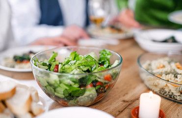 Close-up of vegetable salad in bowl at dinner party at home.
