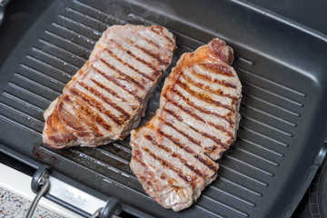 pan-fried beef steak. brown crust on the meat.