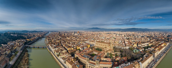 Aerial panorama of Florence at sunrise, Firenze, Tuscany, Italy, cathedral, river, drone pint view,...