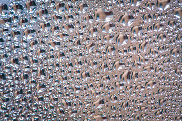 drops of morning dew on glass