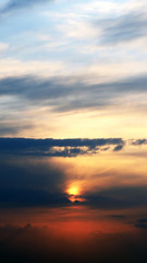 Defocus. Dramatic spring sky sunset. Sunset in the sky as a background.