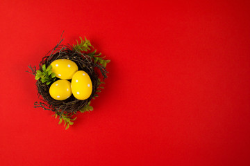 Colorful decorated Easter eggs on a red background