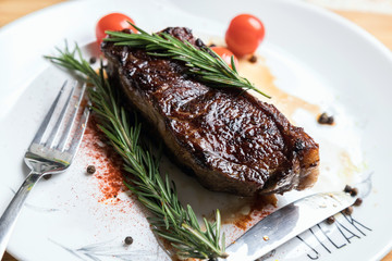 Delicious fresh steak. Juicy piece of meat. Roasted meat. The meat and vegetables.