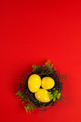 Colorful decorated Easter eggs on a red background