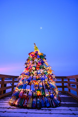 christmas tree near the ocean sunrise