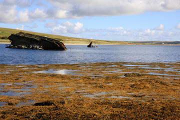 Scapa Flow - Orkney (Scotland), UK - August 08, 2018: World War II boat intentionally sunk to protect the natural harbour of Scapa Flow, Orkney, Scotland, Highlands, United Kingdom