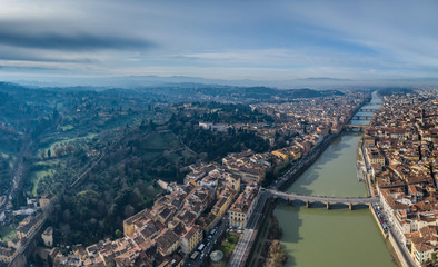 Aerial panorama of Florence at sunrise, Firenze, Tuscany, Italy, cathedral, river, drone pint view, mountains is on background