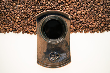 Coffee cup with coffee beans
