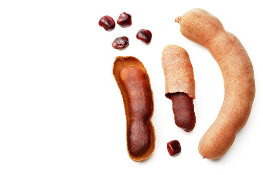 fresh tamarind fruits isolated on white background. top view