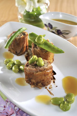 Guinea fowl stuffed with small, broad beans and Marsala wine