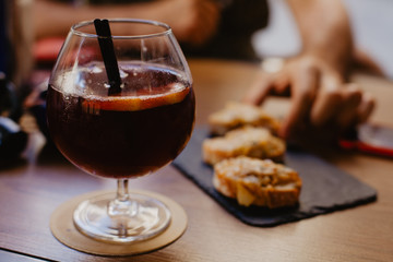 Glass of wine in the street cafe