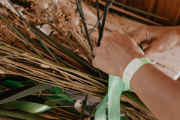 Dried flowers and girl's hands