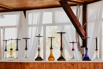 10 hookahs on the bar counter 