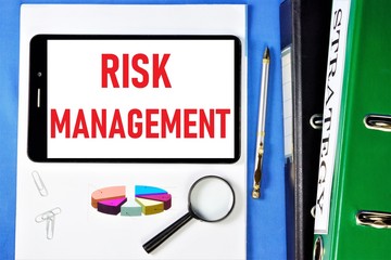 Risk management-lettering on a tablet PC. Analysis of the probability and consequences of adverse...