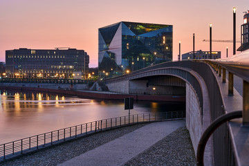 beautiful panoramic view at sunset, Berlin Spreebogen at Hugo-Preuss Bridge with a view of the Cube...