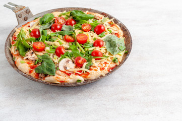 Homemade pizza before baking