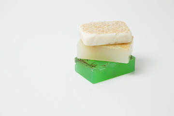 Homemade handmade soaps of organic products on white background - skin care - Natural spa treatments