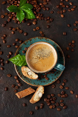 Composition with  coffee cup and tasty cookies with nuts, top view
