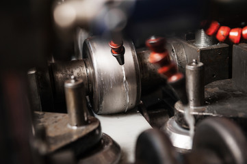 Production of metal products. Pipe forming. Close up