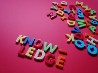 layout of colored letters on the topic of knowledge and education