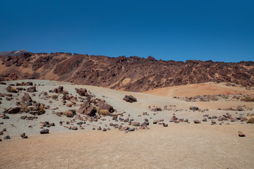Fototapeta na wymiar Minas de San Jose, unusual alien-like terrain surrounding Mount Teide, with remarkable sand dunes and volcanic rocks, a solitary lunar landscape in Teide National Park, Tenerife, Canary Islands, Spain