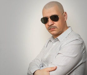 Man with sunglasses and mustaches