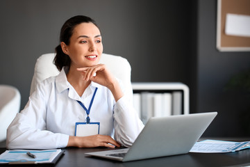 Young female doctor working in clinic