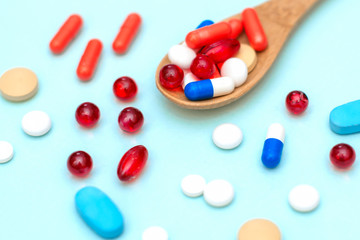 Tablets and vitamins of different colors to fight diseases, viruses and bacteria, to help the immune system and rapid recovery.