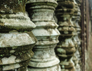 Ancient columns with moss and lichen, close up, perspective, Angkor Wat, Siem Reap, Cambodia