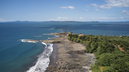 panama jungle in the back ocean in the front