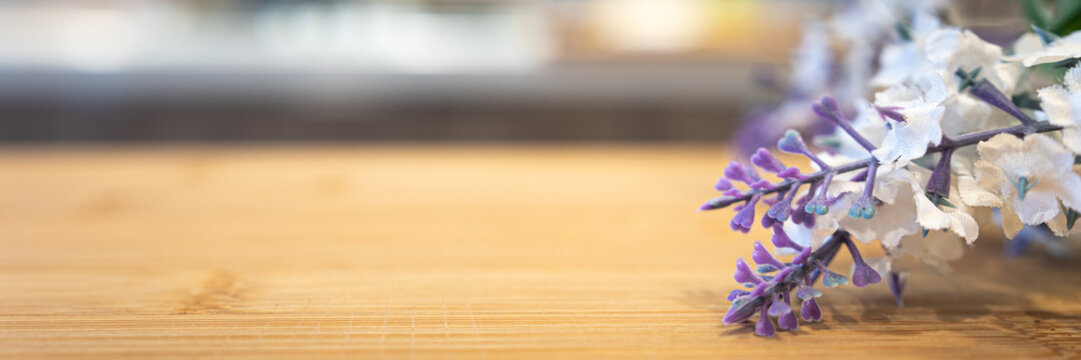 Wooden table top on blur kitchen room background. For displaying the assembly product or visual arrangement of the configuration keys