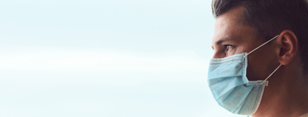 Profile of young sad and tired doctor isolated on white background.