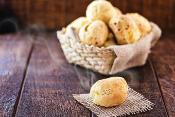 cheese bread made in minas gerais, with selective focus. Rustic background, concept of brazilian cuisine.