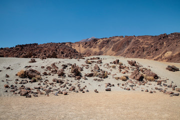 Minas de San Jose, unusual alien-like terrain surrounding Mount Teide, with remarkable sand dunes and volcanic rocks, a solitary lunar landscape in Teide National Park, Tenerife, Canary Islands, Spain