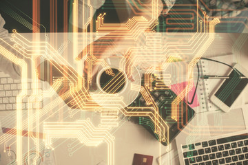 Double exposure of man and woman working together and technology theme drawing. Computer background. Top View. High tech concept.