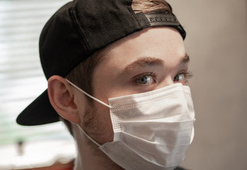 teen wearing a protective breathing mask