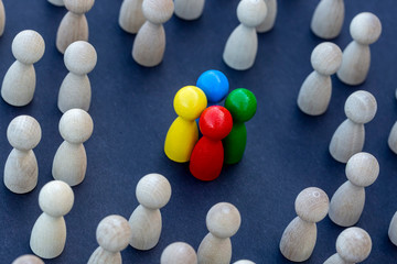 Personal development. Wooden figure in a crowd. Think different.