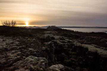 The rift in Myvatn District, Iceland, Europe. Sun goes down in the wintertime.  