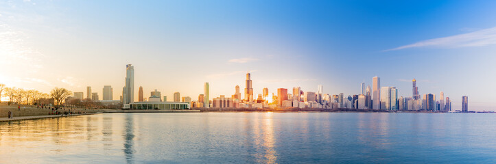 Fototapeta na wymiar Panorama Chicago downtown skyline sunset Lake Michigan with most Iconic building from Adler Planetarium, Illinois