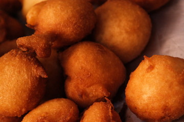 rain cookie - bolinho de chuva fried dough in the shape of balls, tipica do Brasil recipe with cinnamon and sugar