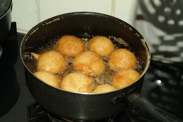 rain cookie - bolinho de chuva fried dough in the shape of balls, tipica do Brasil recipe with cinnamon and sugar