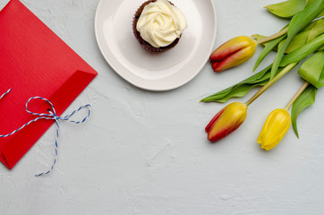 tasty cupcakes and tulip. Mother's day celebration