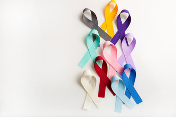 Multi colored cancer ribbons Proudly worn by patients, supporters and survivors for world cancer...