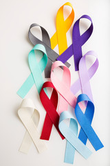Multi colored cancer ribbons Proudly worn by patients, supporters and survivors for world cancer...