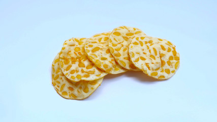 Tempe Chips, a traditional Indonesian snack made from fried soybeans. isolated on white background