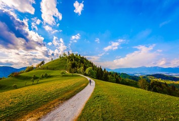 Fototapeta na wymiar Landscape with road and sky clouds in Slovenia
